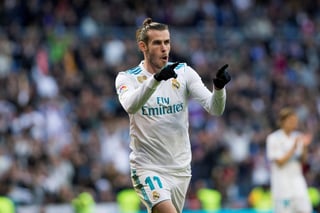 El galés Gareth Bale aportó dos tantos ayer para el Real Madrid. Barcelona y Real Madrid golean a Betis y Deportivo