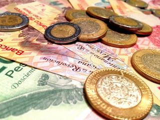 Incertidumbre. El tipo de cambio alcanzó un máximo de 19.67  y un mínimo de 18.30 pesos en enero. (ARCHIVO)