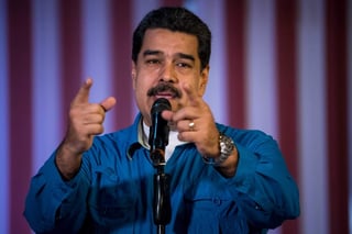 'Los sectores extremistas que gobiernan Estados Unidos, y las oligarquías aliadas en el continente al final han decido no participar en el proceso electoral y le van a imponer a la oposición la línea de la abstención y el sabotaje del proceso presidencial', dijo Maduro en un encuentro con la coalición oficialista Gran Polo Patriótico (GPP). (EFE)