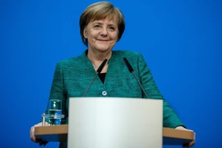 El pacto sienta las bases para el gobierno 'estable' que necesita Alemania y que 'muchos en el mundo esperan', subrayó Merkel, en puertas de ser investida jefe del ejecutivo por cuarta vez. (EFE)