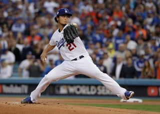 Yu Darvish, pitcher de los Dodgers de Los Ángeles, lanza ante los Astros de Houston en el séptimo juego de la Serie Mundial del año pasado. (AP)