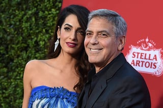 Ayuda. El actor George Clooney y su esposa, Amal Clooney, donaron 500 mil dólares a marchas contra la violencia armada. (ARCHIVO)