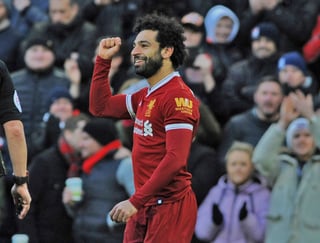 Mohamed Salah anotó cuatro goles ante Watford y ya superó a Messi en la pelea por la Bota de Oro. (EFE)