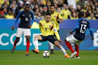 La desolación reinó en Francia, mientras Colombia mostró aplomo para controlar el partido. La remontada resonaba como una gesta que llena de esperanza a los cafeteros. (EFE)