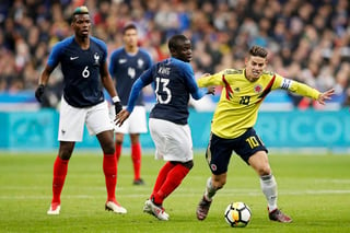 Colombia se levantó luego de ir perdiendo por dos goles y venció a su similar de Francia por 3-2 en la cancha del Stade de France. (AP)