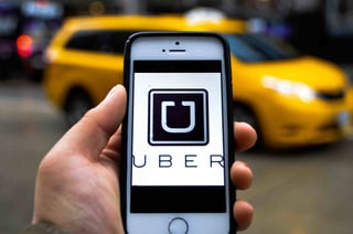 Mundial. Uber es una empresa internacional que proporciona a sus clientes una red de transporte privado, a precios competitivos. (ARCHIVO)