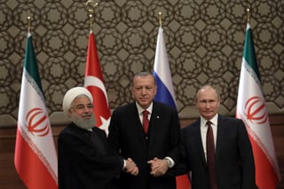 Rusia, Irán y Turquía firmaron hoy en Ankara una declaración conjunta con la promesa de impulsar un proceso de paz en Siria que desemboque en unas elecciones supervisadas por Naciones Unidas. (AP)