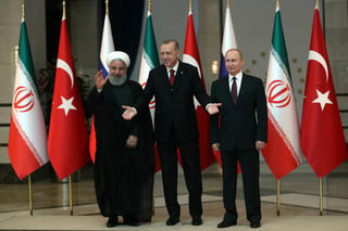 Impulsores. Los presidentes de Irán, Turquía y Rusia apoyarán el proceso de paz en Siria. (AP)