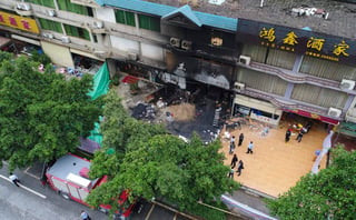 China detuvo este martes a un hombre sospechoso de provocar un incendio que mató a 18 personas e hirió a otras cinco. (AP)