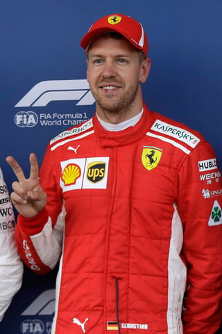 Sebastian Vettel consiguió su tercer ‘pole’ consecutiva. (AP)