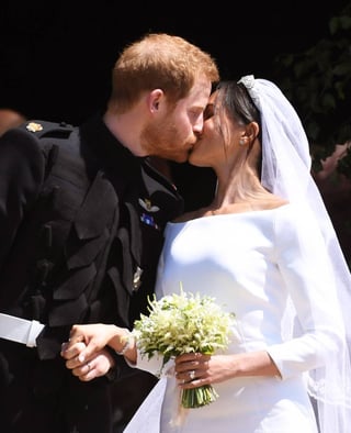 Se dan el sí. Ante 600 personas, el príncipe Harry y la actriz estadounidense intercambiaron sus votos matrimoniales. 