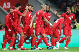 Jugadores de la selección de Túnez durante un partido amistoso entre Túnez y Portugal, en Braga, en días pasados. (EFE)