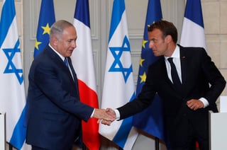 El presidente de Francia, Emmanuel Macron, y el primer ministro de Israel, Benjamin Netanyahu, discreparon ayer aquí sobre la postura occidental hacia Irán. (AP)