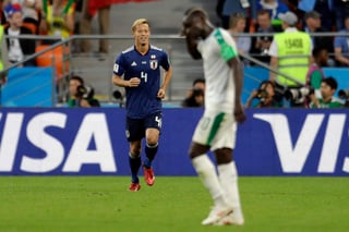 Keisuke Honda marcó el segundo gol de Japón con el que empató ante Senegal. (AP)