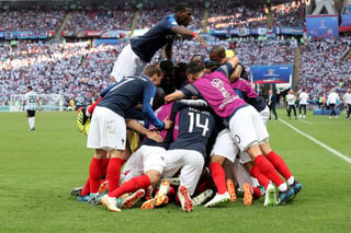 Francia venció 4-3 a Argentina en el duelo de octavos de final. (AP) 