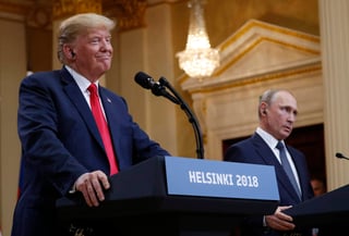 Trump aseguró que, durante sus cuatro horas de reuniones con Putin, ambos hablaron 'un buen rato' sobre la supuesta injerencia rusa en las elecciones de Estados Unidos. (AP)