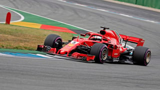 Gracias a un tiempo de 1:11.212, nuevo récord en Hockenheim, Sebastian Vettel iniciará la carrera del domingo desde el primer puesto de la parrilla de salida. (EFE)