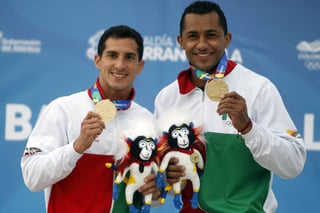 La dupla mexicana de Rommel Pacheco y Jahir Ocampo se apoderó de la presea de oro en la final de clavados sincronizados en trampolín de tres metros, en los Juegos Centroamericanos y del Caribe. (Jam Media)
