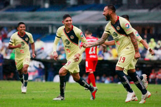 Víctor Aguilera, del América, en festejo después de anotar el primer gol de su equipo.  (Jam Media)
