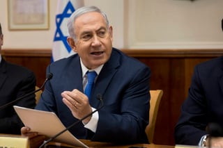 'No hay mejor evidencia de la necesidad de una ley nacional', afirmó Netanyahu en un mensaje en su cuenta de Twitter que acompañó de un vídeo de participantes en la manifestación que portaban banderas palestinas. (ARCHIVO)
