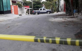Al menos tres de estos cadáveres habían sido descuartizados y uno más había sido decapitado, de acuerdo con los reportes preliminares presentados por la Fiscalía General de Quintana Roo. (ARCHIVO)