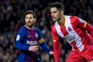 El astro argentino Lionel Messi, del Barcelona, en acciones contra el Girona en partido de la campaña pasada.