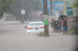 En entrevista Jaime Albarrán, meteorólogo del SMN, explicó que las precipitaciones en esa entidad han sido causadas por los remanentes de la depresión tropical número 19 la cual dejó nubosidad sobre Culiacán. (EFE)