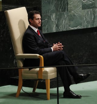 Se despide. El presidente de México, Enrique Peña Nieto, dio un discurso de 14 minutos. (EFE)