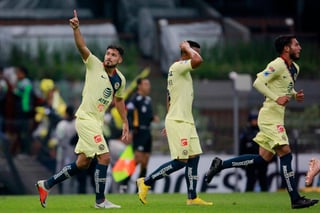 Bruno Valdez (i), del América, en festejo después de anotar el segundo gol de su equipo durante el juego de octavos de final de la Copa MX. (Jam Media)