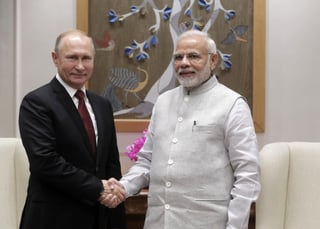 Encuentro. Los mandatarios de Rusia e India participan en un foro de negocios. (EFE)