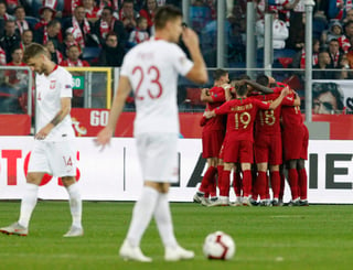 Los jugadores de la selección de Portugal festejan tras marcar un tanto ante Polonia en un encuentro de la Liga de Naciones de la UEFA.