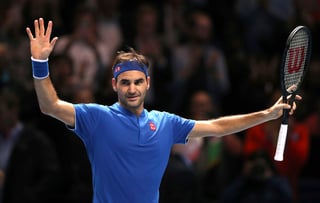 El suizo Roger Federer festejaba luego de vencer al sudafricano Kevin Anderson, ayer en la Copa Masters.