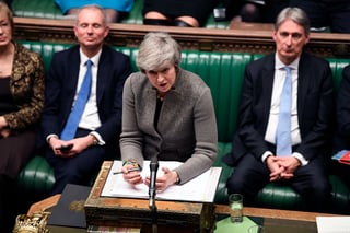 Tiempo. La primera ministra Theresa May aplazó a mediados de enero el voto en el Parlamento. (AP)