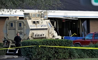 Tragedia. Un hombre armado asaltó una sede del banco SunTrust y mató al menos a cinco personas. (AP)