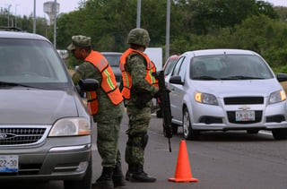 La Guardia Nacional estará integrada por agentes de las policías militares de la Marina y la Federal, al mando de la Secretaría de Seguridad Pública, para reforzar la seguridad en el país, que en 2018 registró más de 33,000 homicidios. (ARCHIVO)