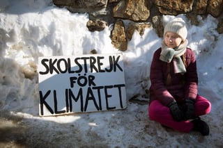 La activista sueca Greta Thunberg participó en una protesta medioambiental bajo el lema 'School Strike for Climate' (lit: huelga escolar por el clima) en el Foro de Davos, en Suiza. (EFE)