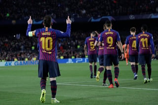 El argentino Lionel Messi festeja tras anotar el tercer tanto del Barcelona ante Lyon en la vuelta de los octavos de final.