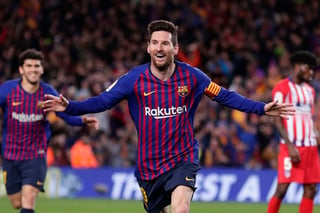 El argentino Lionel Messi, del Barcelona, festeja tras anotar el segundo tanto ante el Atlético de Madrid.