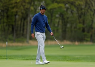 El estadounidense Tiger Woods busca su segundo torneo grande de la temporada. (ARCHIVO)