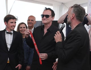 Tarantino se alzó con el premio Palm Dog, que se entrega anualmente a los astros caninos. (AP)