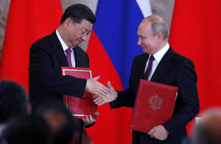 El mandatario chino Xi Jinping y el presidente ruso Vladímir Putin acordaron acciones ante las sanciones de EUA. (EFE)