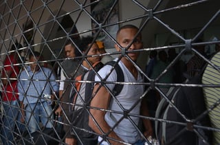 El grupo de 58 hombres y una mujer se encontraban presos en Caracas desde hace tres años.
