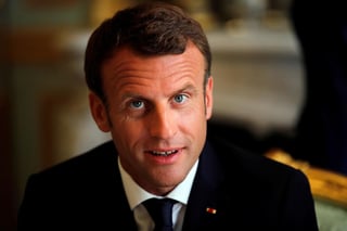 Macron comprometió a Francia para relanzar esfuerzos que contribuyan a la protección de los migrantes. (EFE)