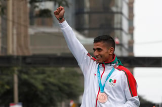 Joel Pacheco Orozco comentó que el realizar una buena preparación fue la clave para estar en el podio y desde luego plantear desde el inicio dar a México dos medallas. (AP)
