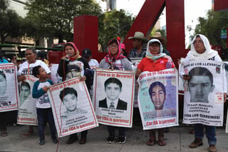La detención de Santiago N, 'El Carrete', presunto líder de 'Los Rojos', podría ayudar a las autoridades federales a esclarecer lo sucedido a los 43 normalistas desaparecidos de Ayotzinapa. (ARCHIVO)