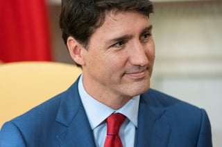 A pesar de la decisión del comisionado de Ética, Trudeau se negó hoy a disculparse por sus acciones y dijo que aunque aceptaba las conclusiones del informe no estaba de acuerdo con algunas de las determinaciones. (ARCHIVO)