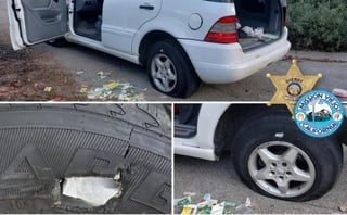 En las fotos publicadas por los Servicios de Policía de Mission Viejo puede apreciarse una gasa colocada dentro de un agujero en el neumático y alrededor un equipo de primeros auxilios tirado en la calle. (ESPECIAL)
