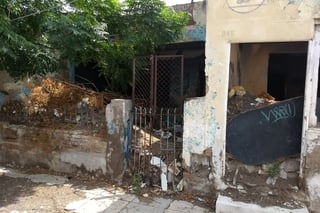Un basurero, casa en ruinas Urgen a una reparación inmediata