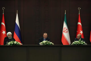 La quinta cumbre trilateral sobre Siria, celebrada este lunes en Ankara, ha acabado sin limar las diferencias entre los tres líderes participantes, el presidente turco, Recep Tayyip Erdogan; el ruso, Vladímir Putin; y el iraní, Hasan Rohaní. (EFE)