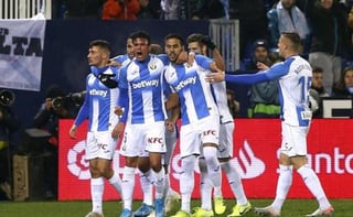Jugadores del Leganés celebran tras marcar un tanto, en la victoria del equipo 3-2 sobre Celta de Vigo. (EFE)